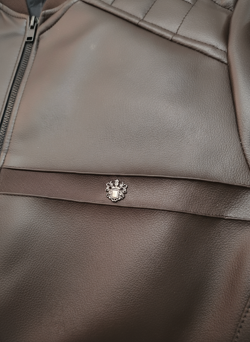 Emblem detail in medium brown